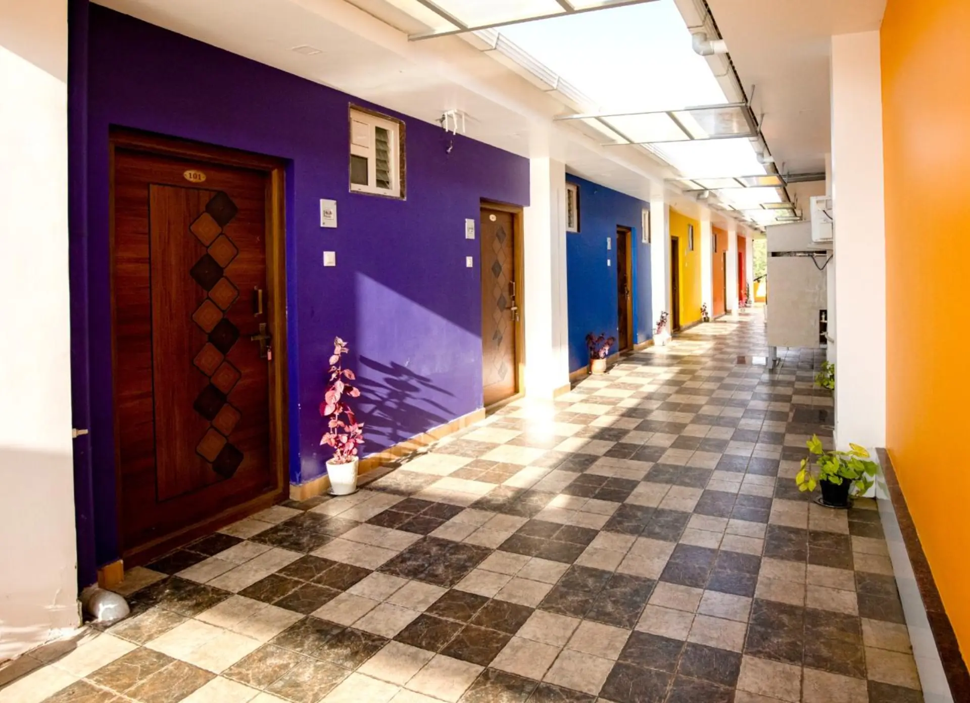 Colorful resort corridor leading to guest rooms